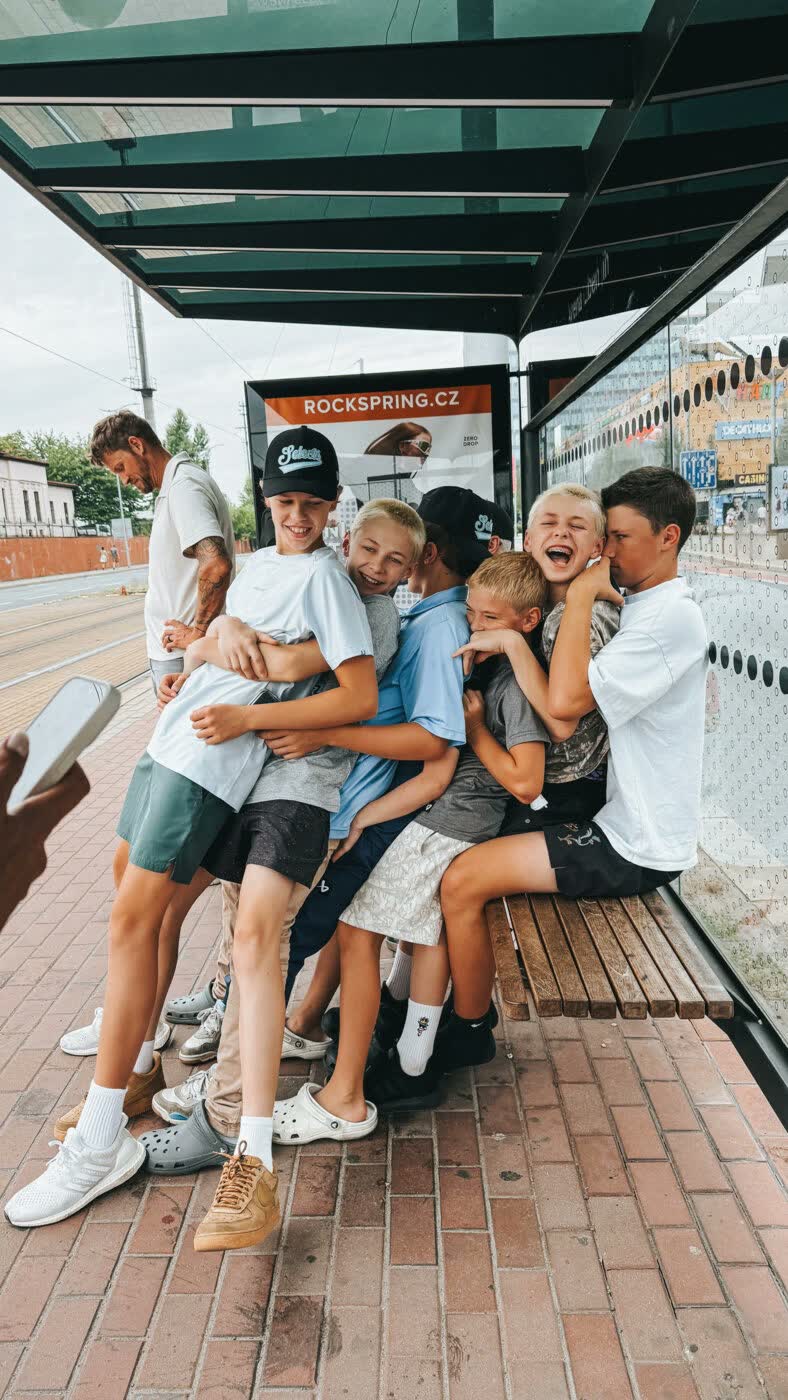Tour teammates laughing in Prague