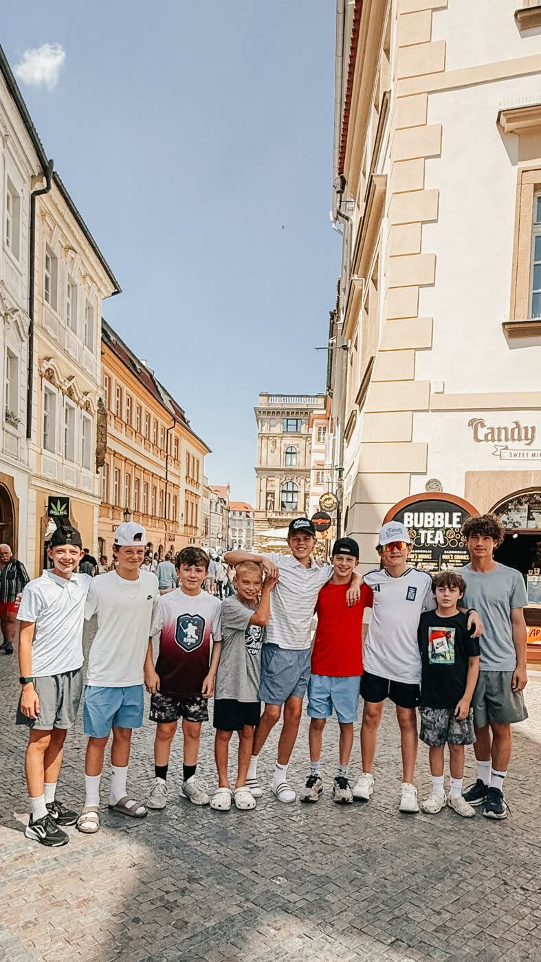 Team walking Prague's old town