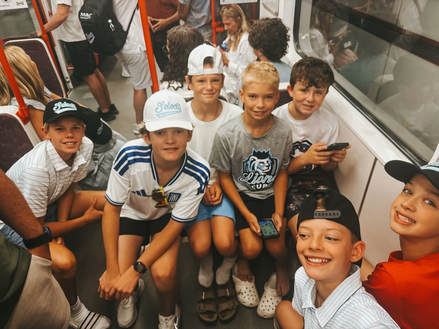 Players on the metro between games