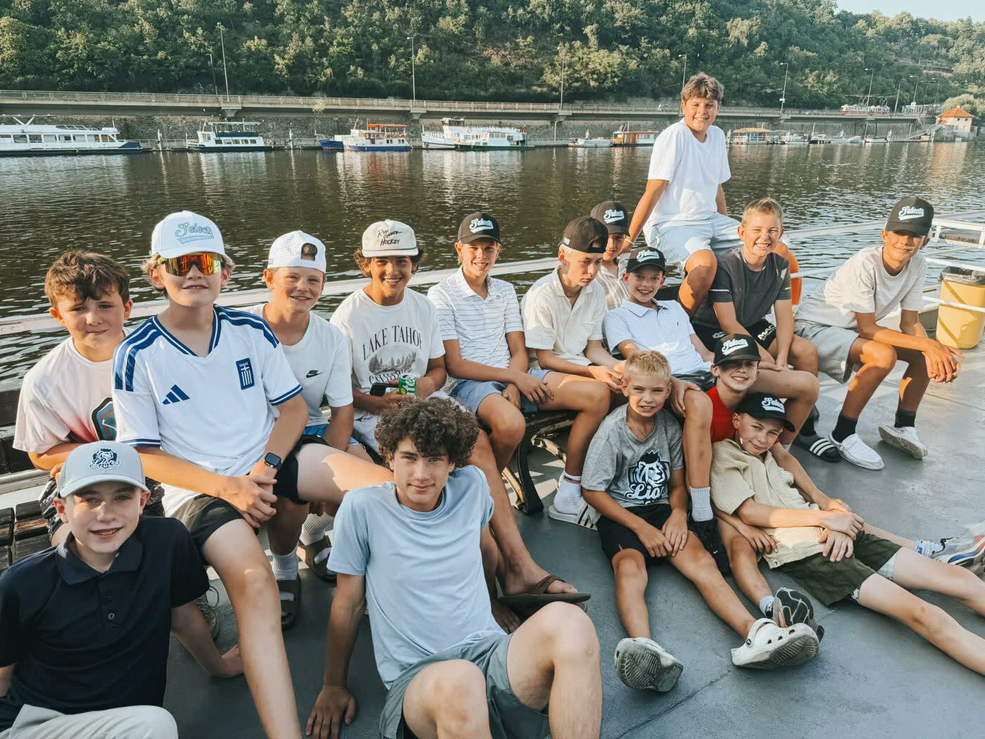 The team on the riverbank in Prague